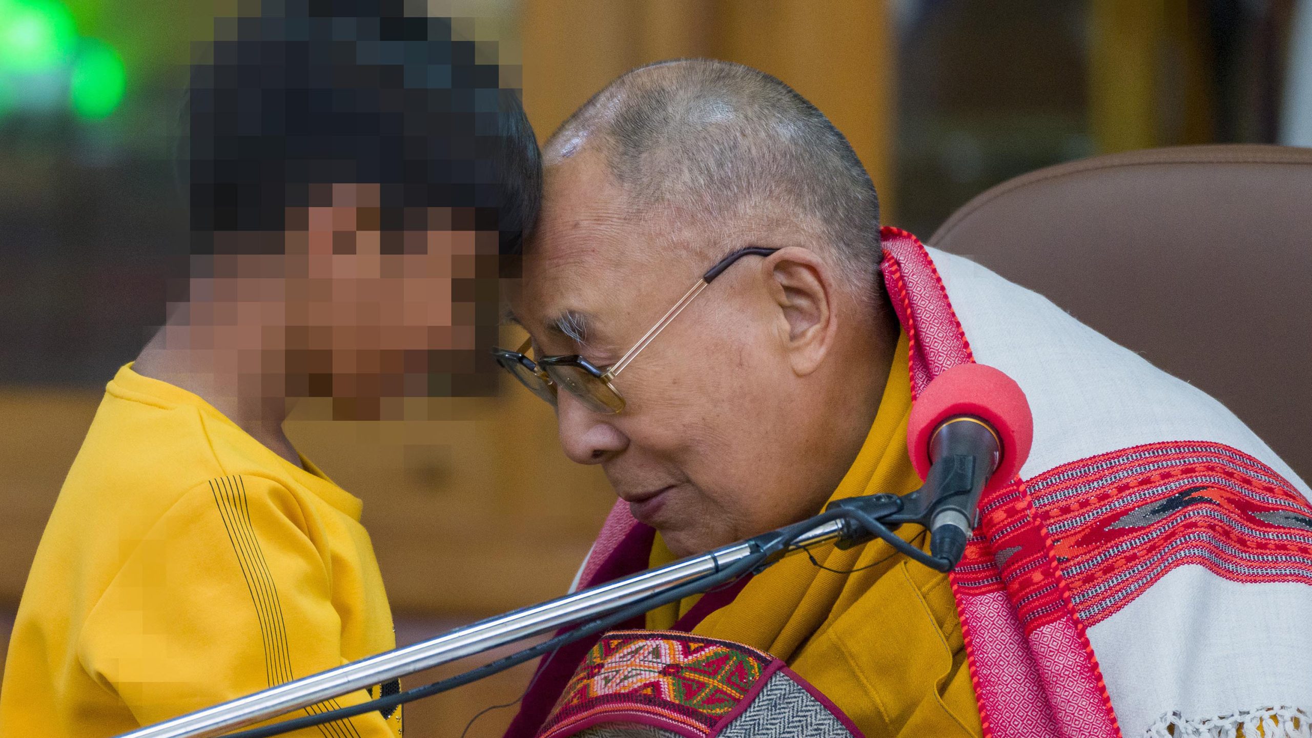 13109706_041023-cnn-ap-dalai-lama-child-blurred-img-scaled.jpg